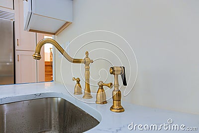 New modern white kitchen with built chrome water tap Stock Photo