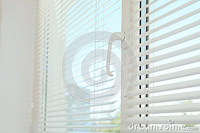 New modern window with blinds indoors Stock Photo