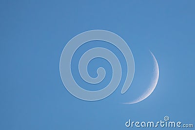 New Moon in the daytime on the day blue sky Stock Photo