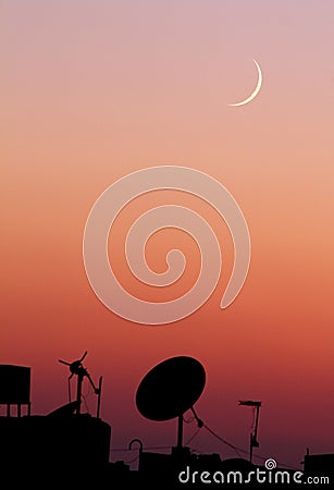 The new moon or crescent during sunset in ramadan month in egypt in africa Stock Photo