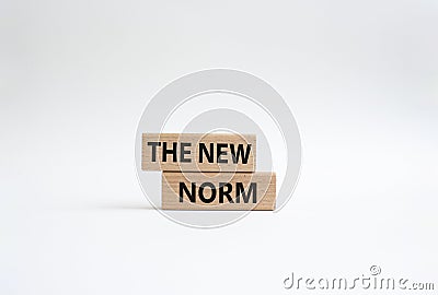 The new norm symbol. Concept words The new norm on wooden blocks. Beautiful white background. Business and The new norm concept. Stock Photo