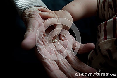 young and old hands Stock Photo