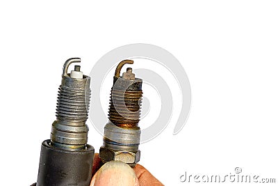 New and old spark plugs on white background Stock Photo