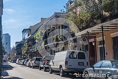 New Orleans, LA/USA - circa January 2008: Old Colonial House with ironwork galleries on the Streets of French Quarter decorated Editorial Stock Photo