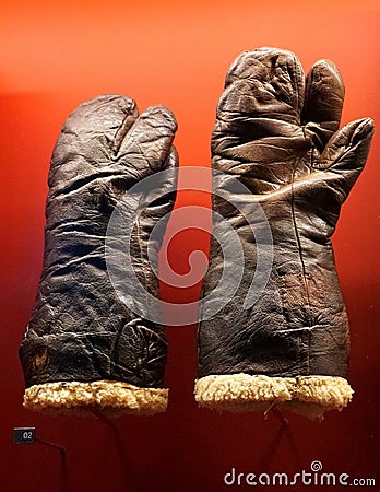 New Orleans, Louisiana, U.S.A. - February 5, 2020 - Type A9 winter flying gloves worn by bombardier during World War 2 Editorial Stock Photo