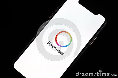 New Payoneer application icon on on mobile phone screen. Editorial Stock Photo