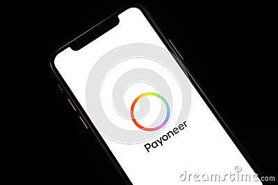 New Payoneer application icon on on mobile phone screen. Editorial Stock Photo