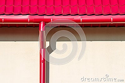 New rain water downspout on wall Stock Photo