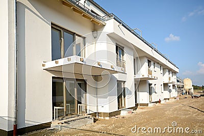 New residential building with facade and balconies - Construction work near completion Stock Photo