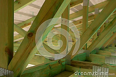 New residential construction home framing against a sunny sky.Local focus. Stock Photo