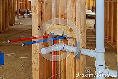 New residential construction house framing a plumbing the laundry room Stock Photo