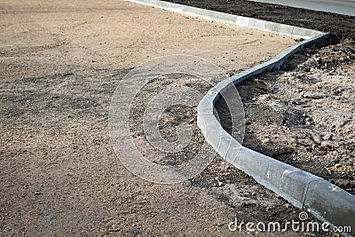 New road installation, concrete structures. Reconstruction and asphalt laying Stock Photo