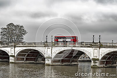 New Routemaster Double-decker bus crossing Kingston Bridge over the River Thames in Kingston, England Editorial Stock Photo