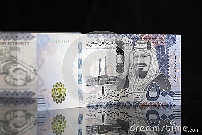 New Saudi Riyal notes with black background Stock Photo