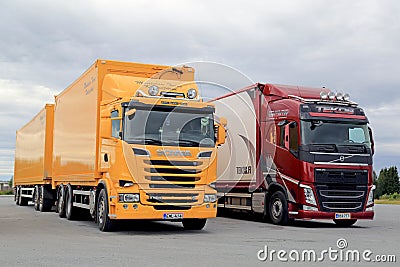 New Scania and Volvo Transport Trucks Parked Editorial Stock Photo