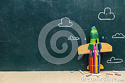 New semester concept, Paper rockets with stationery equipment. Stock Photo