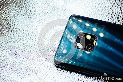 New smartphone from Huawei-Mate 20 Pro, Emerald Green, isolated on shiny background. Editorial Stock Photo