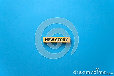 New story - phrase from wooden blocks with letters, Personal History Achievement Biography My story concept, blue background Stock Photo