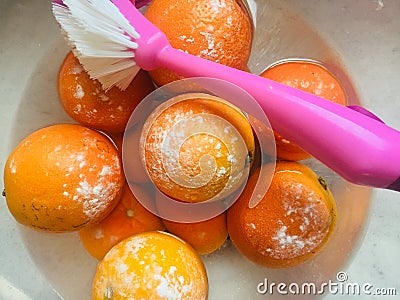 A new study finds baking soda may clean the fruit better than other washing methods Stock Photo