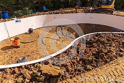 New Swimming pool being installed Stock Photo
