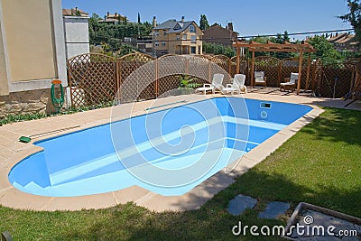 New swimming pool in a garden Stock Photo