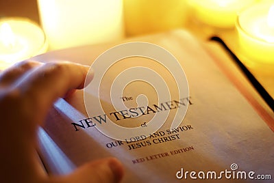 New Testament by Candlelight Stock Photo