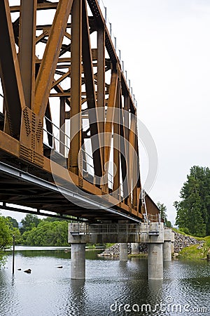 Rusty railway bridge across the Washougal river Stock Photo