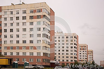 New Urengoy, YaNAO, North of Russia. September 1, 2013. Many-storeyed houses on the passage Of the Peoples of the North Editorial Stock Photo