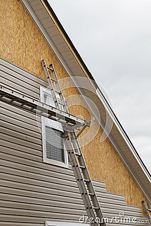 New Vinyl Siding Installation On A Home In The South Stock Photo