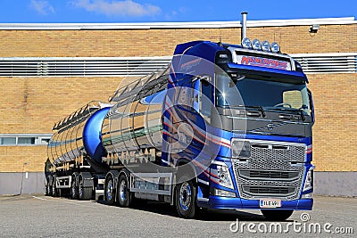 New Volvo FH Tank Truck by a Warehouse Editorial Stock Photo