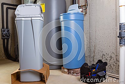 New water softening unit ready for installation Stock Photo