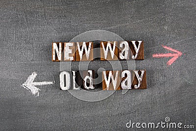 New Way and Old Way concept. Chalk arrows on a dark chalk board Stock Photo