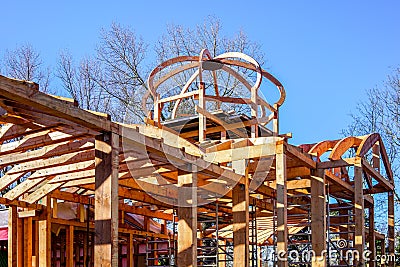 New wooden building frame with a round domed tower Stock Photo