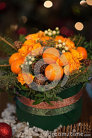 New year a bouquet of flowers and tangerines Stock Photo