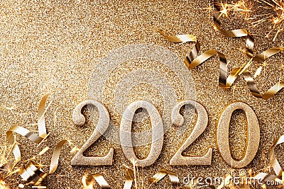 New Year celebration and festive background with golden numbers 2020, streamers and Christmas decorations top view Stock Photo