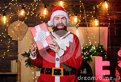 New year celebration. Santa claus hold gift box. Man bearded santa celebrate christmas with presents. Celebrate with joy Stock Photo