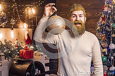 New Year, Christmas card. Beard with Christmas decoration. Funny santa Wish you merry christmas. Santa portrait for Stock Photo