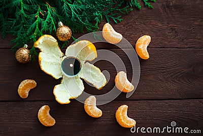 New Year and Christmas concept. fir branches, candles and mandarin. winter mood. selective focus Stock Photo