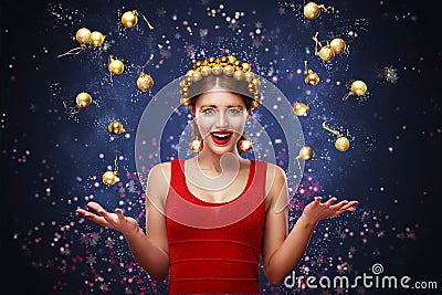 New Year, christmas, holidays concept - smiling woman in dress with gift box over lights background. 2017 Stock Photo