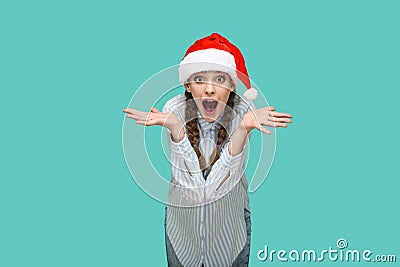 New year concept. amazed beautiful girl in striped light blue sh Stock Photo