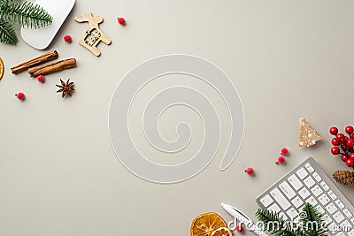New Year concept. Top view photo of keyboard computer mouse deer wood ornament mistletoe berries pine branches dried orange slices Stock Photo