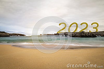 New year 2023 dawning on a quiet beach Stock Photo