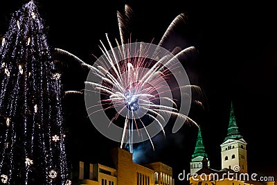 New year eve with fireworks in the city. Stock Photo