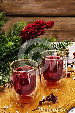 New Year Festive berries liqueur or tincture as ingredient for preparation alcohol cocktail Stock Photo