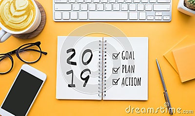 2019 new year goal,plan,action text on notepad Stock Photo