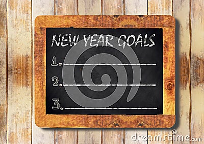 New year goals chalk on the blackboard Stock Photo