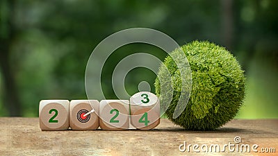New year 2024, Green business, enviromental sustainability target. Carbon offset, neutrality strategies. 2024 written on wooden Stock Photo