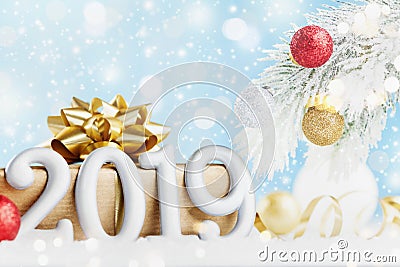 New year 2019 greeting card. Holiday decorations and snowy fir tree Stock Photo