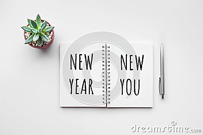 New year new you text on notepad Stock Photo