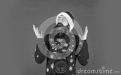 New year party. Christmas time. Have fun. Promoting goods. Finding perfect present. Bearded man santa hat. Emotional Stock Photo